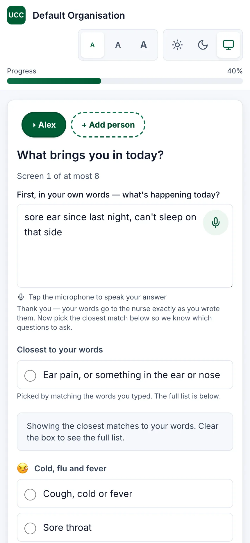 The same screen after the patient has written a sentence, with the closest matching choices listed below it under plain headings such as “Cold, flu and fever” and “Tummy, toilet and waterworks”.